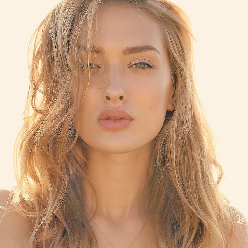 Woman outside smiling