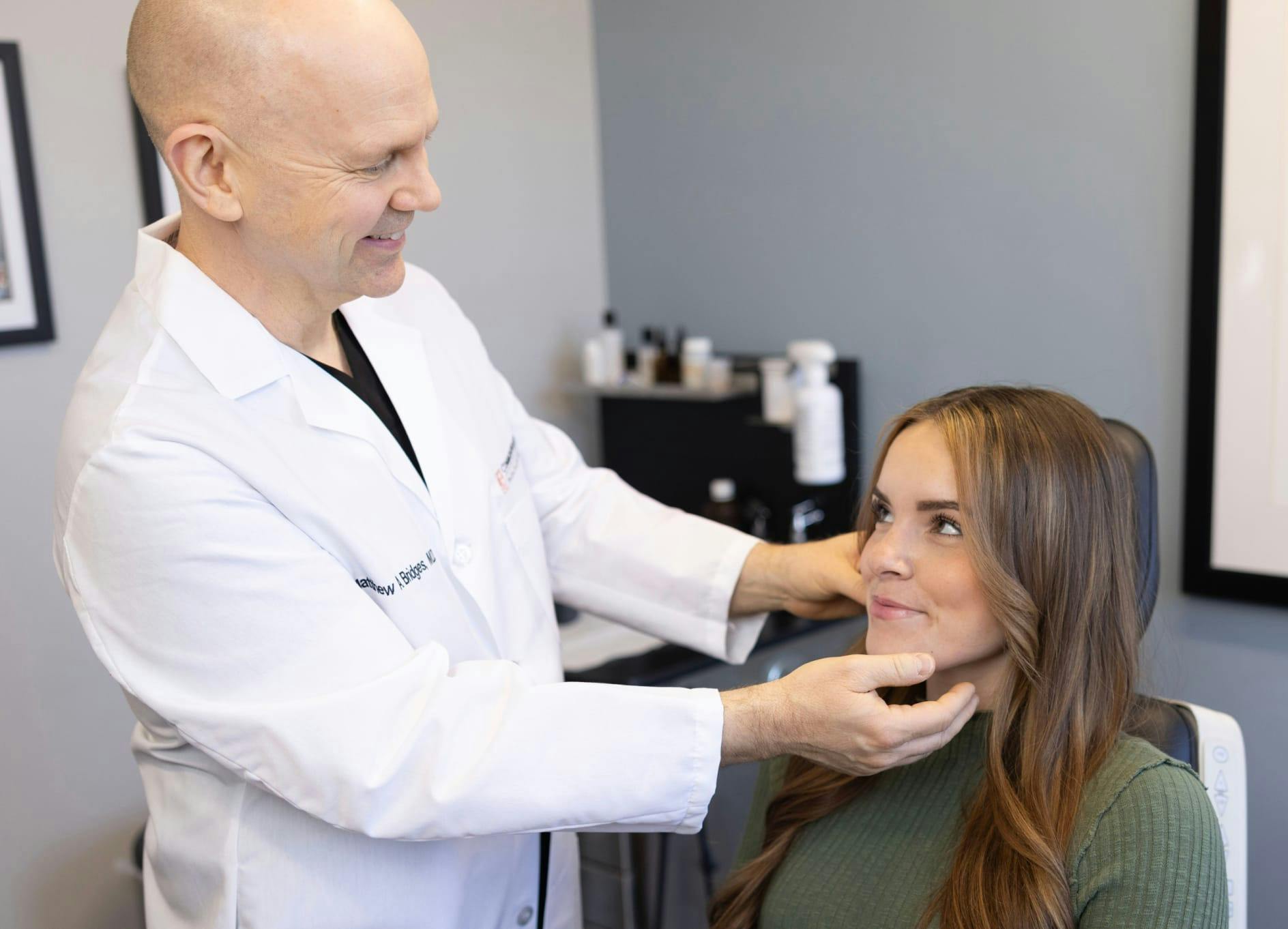 Doctor Matthew Bridges working with a patient