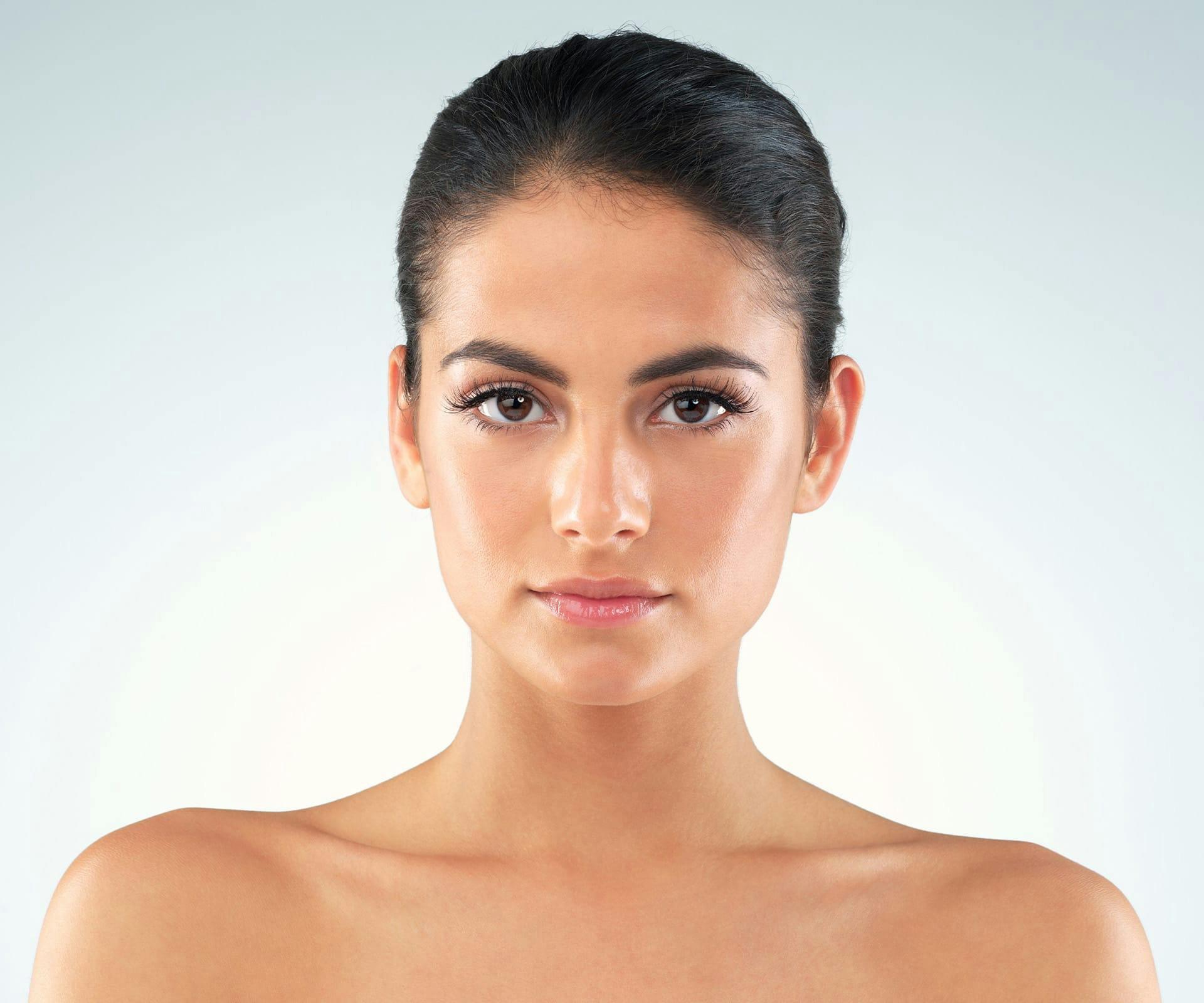 Woman with hair tied back