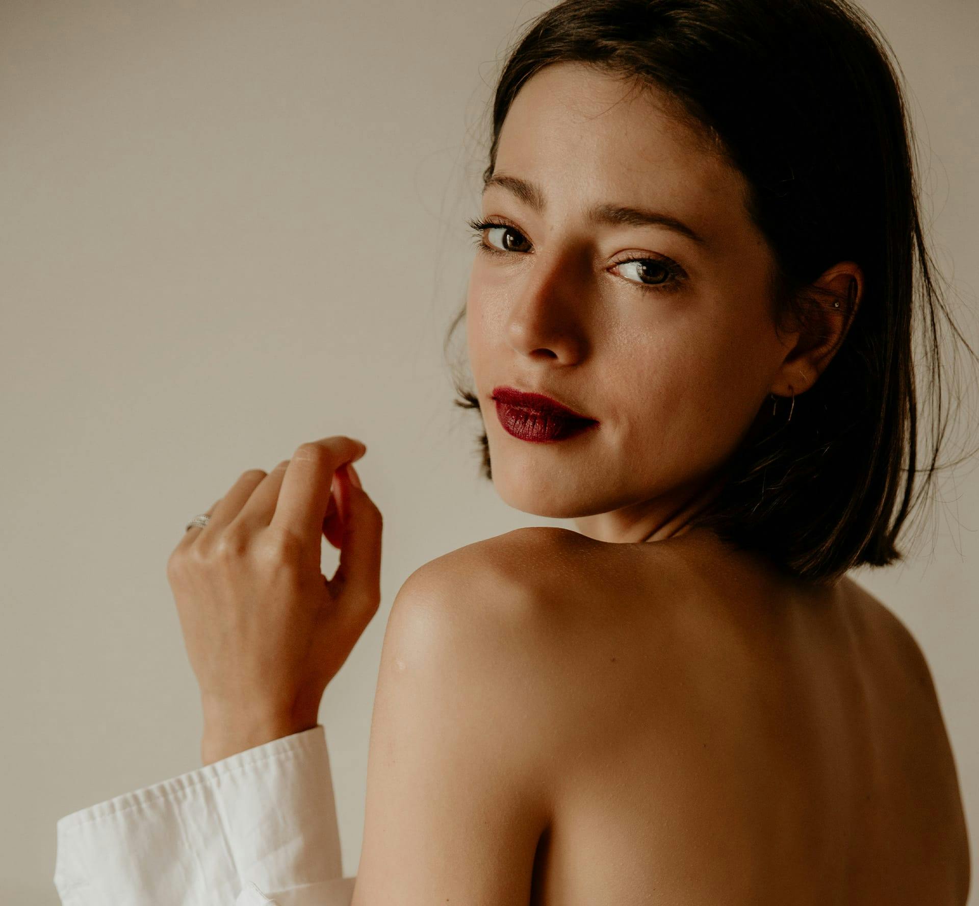 woman smiling over shoulder