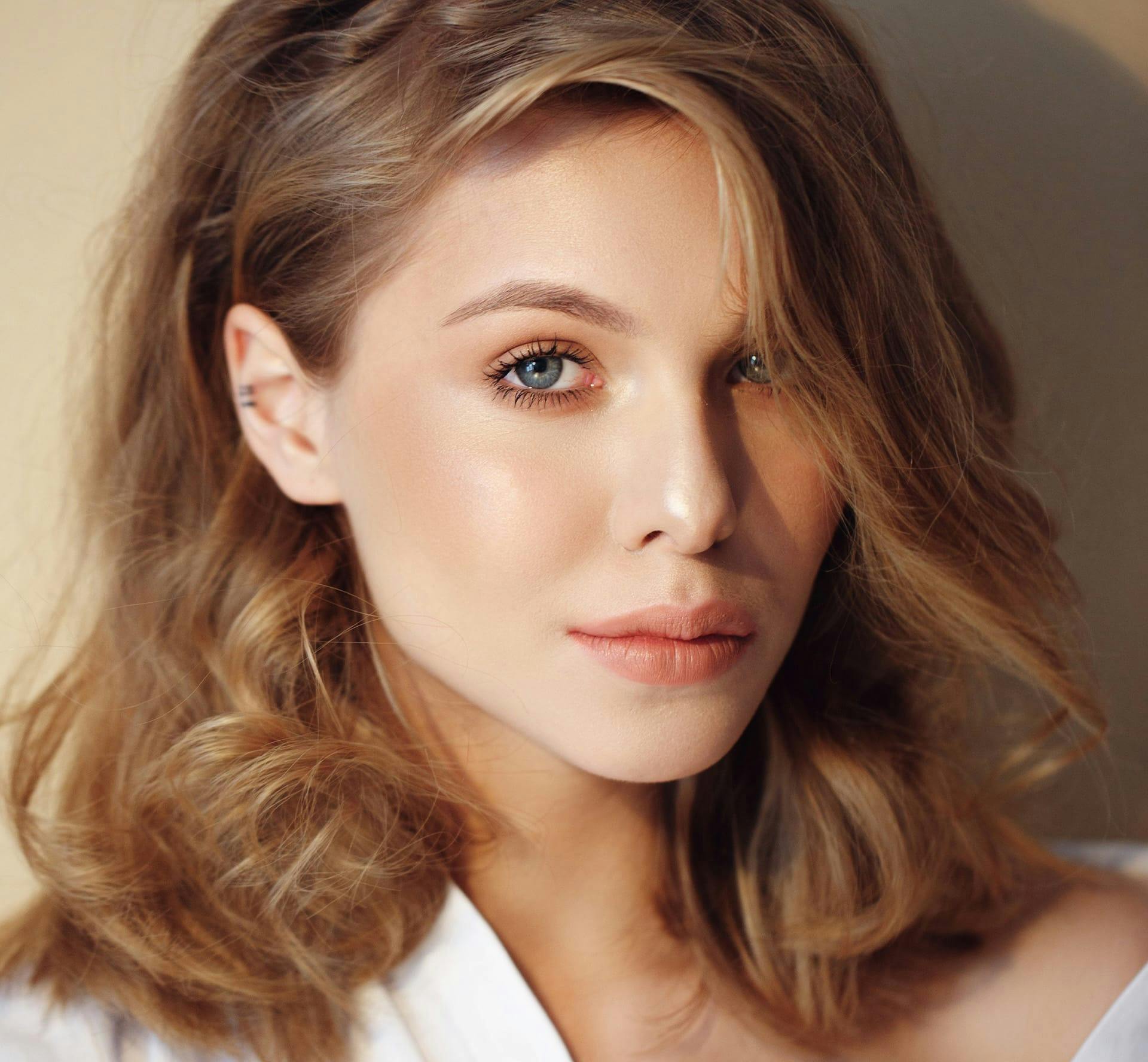 Woman with hair covering part of her face