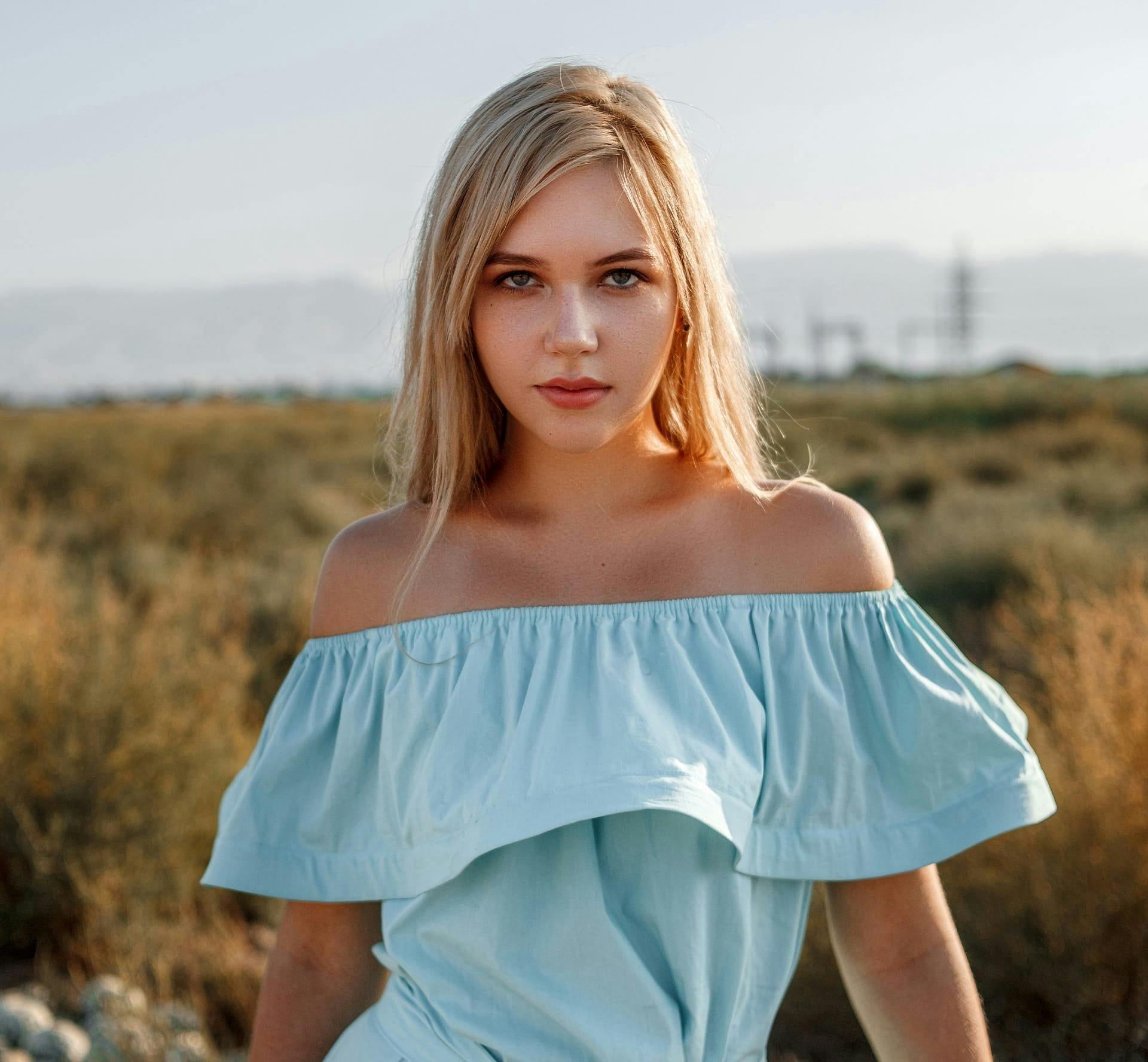 woman in light blue dress