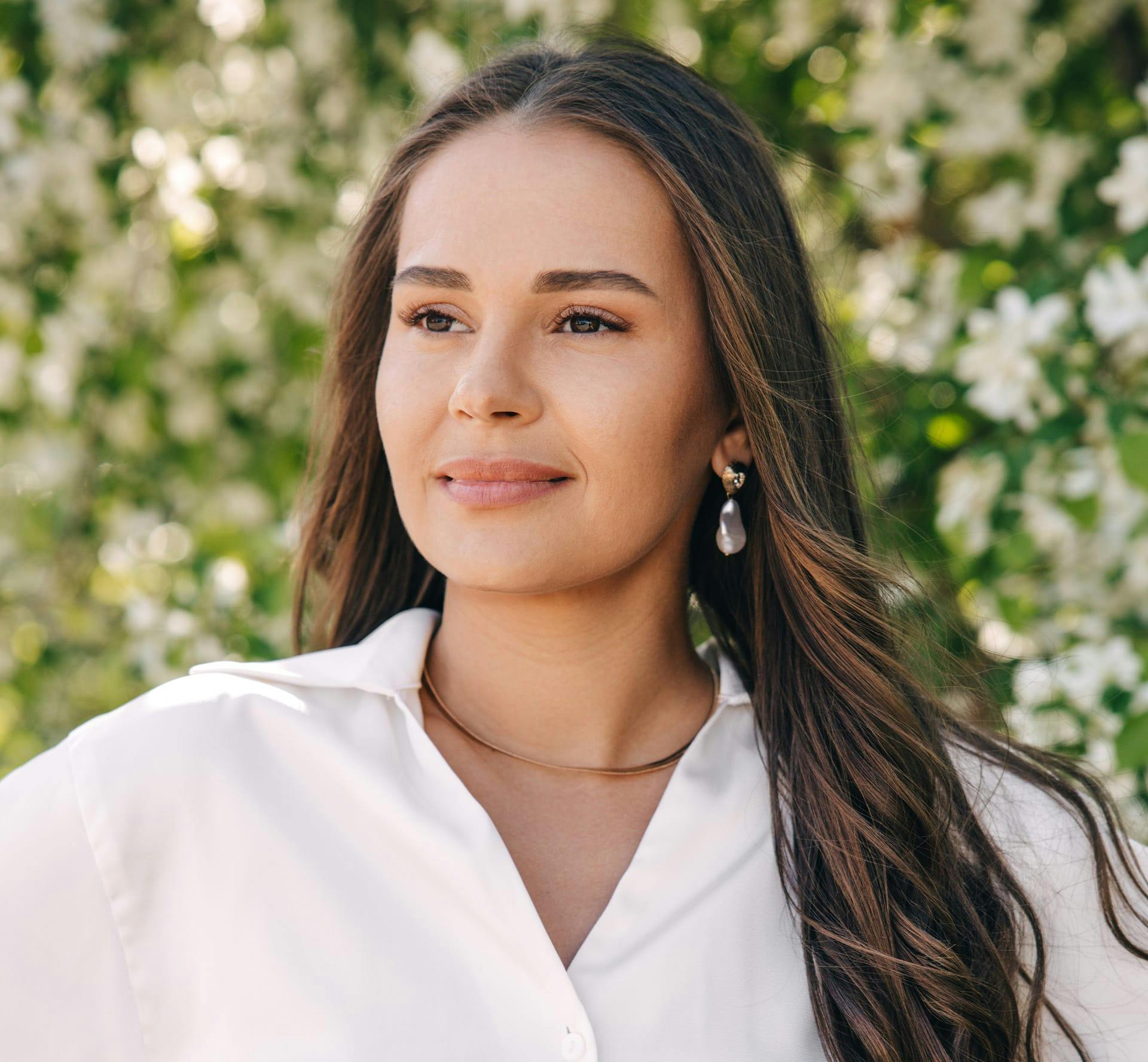 Smiling woman with long brown hair
