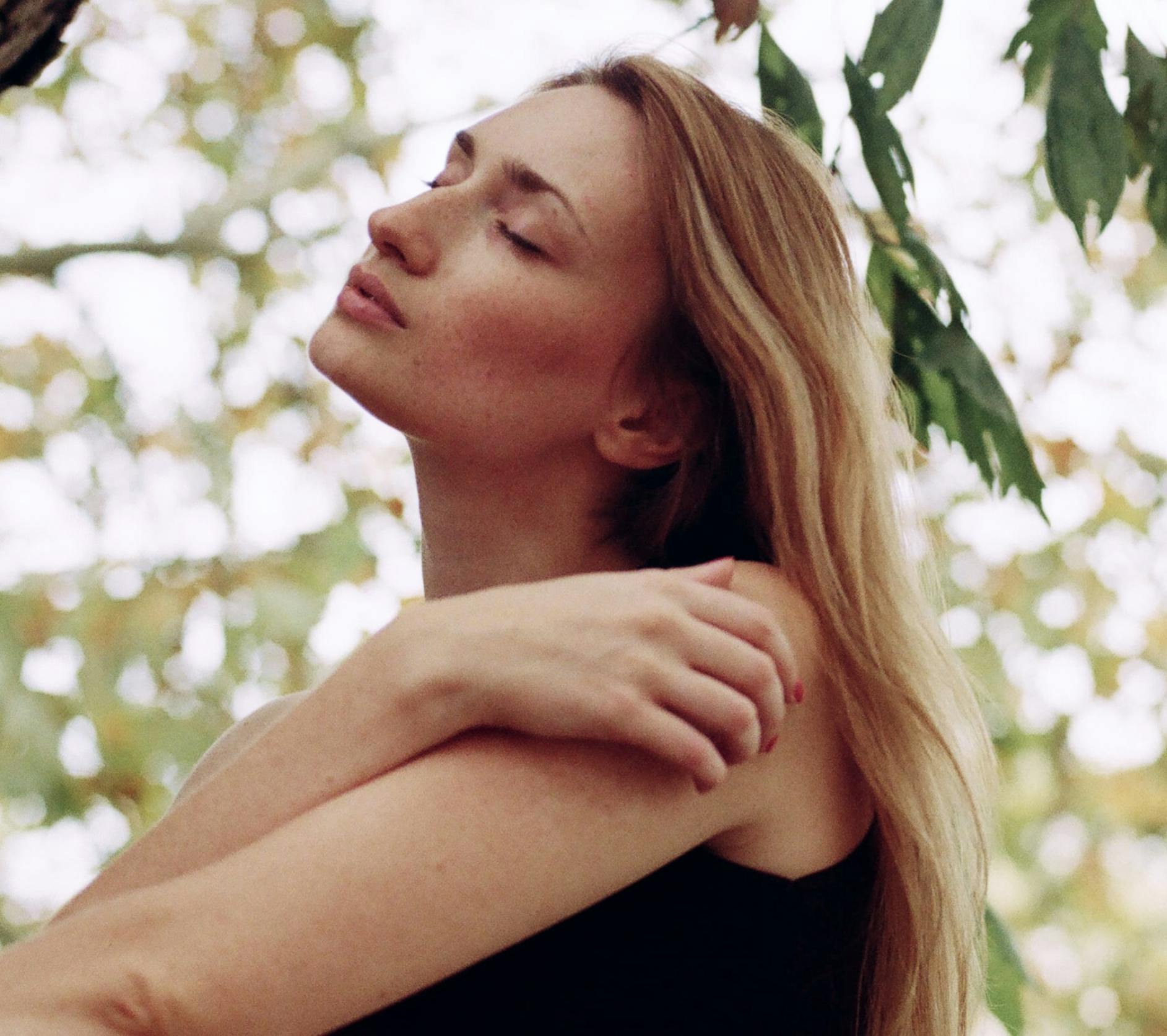 Woman with her eyes closed