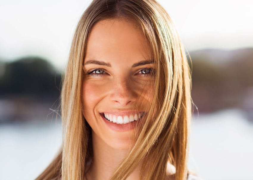 Blonde woman smiling