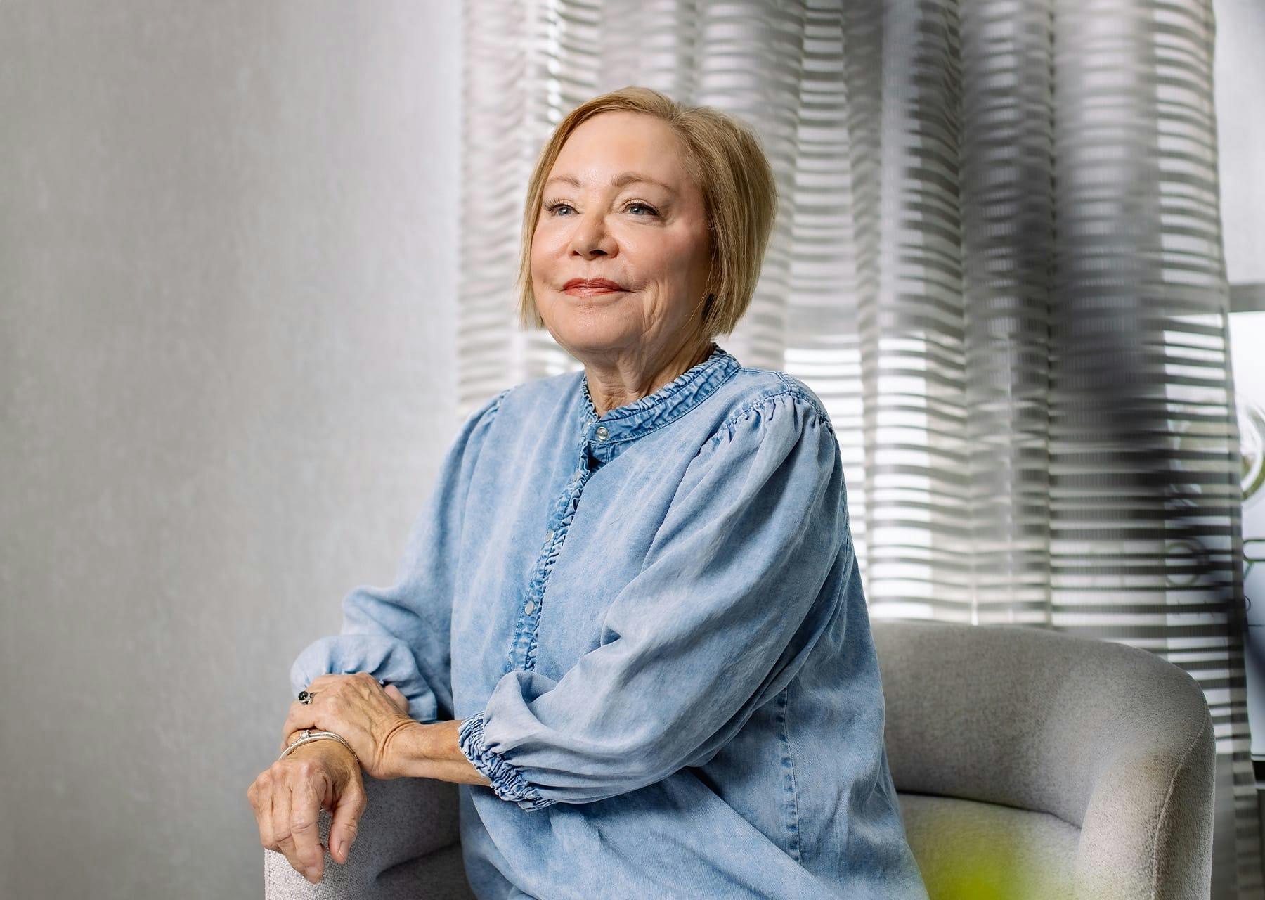 Woman sitting in chair