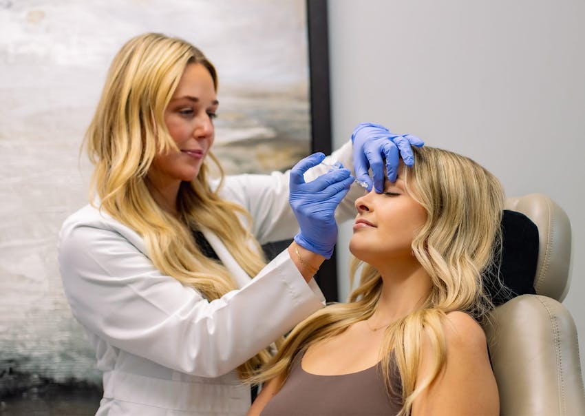 woman getting an injectable treatment