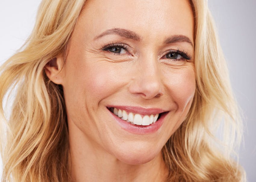 Blonde woman smiling