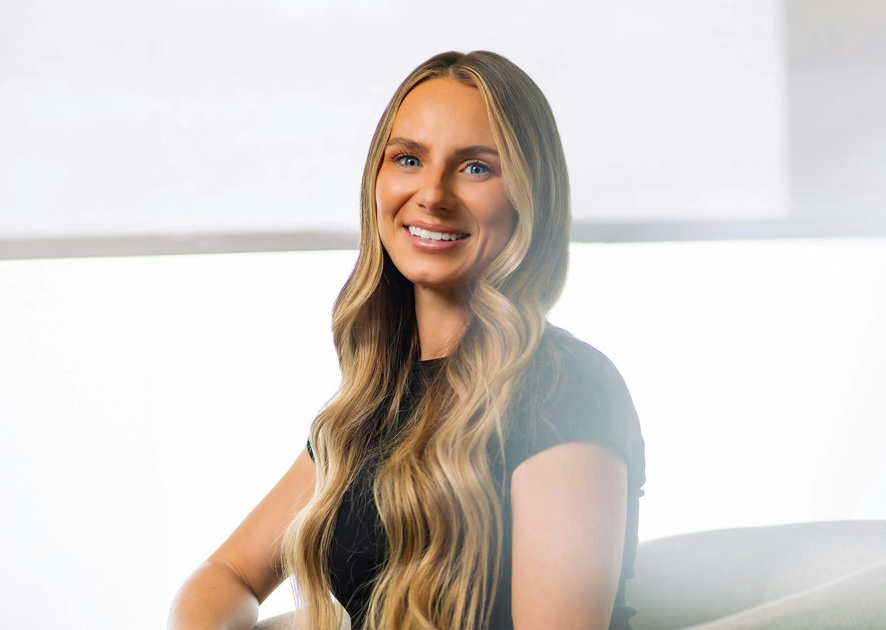 woman with long blonde wavy hair