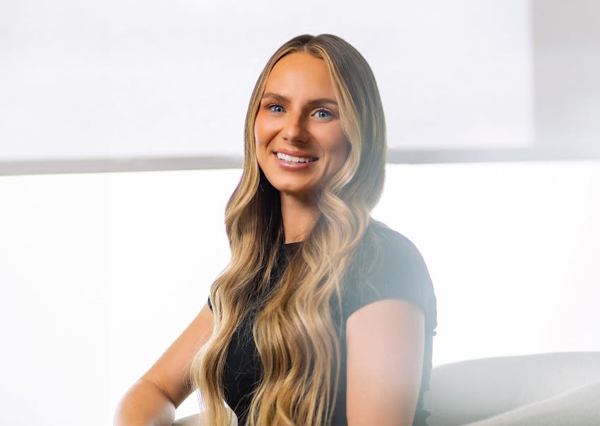 woman with long blonde wavy hair