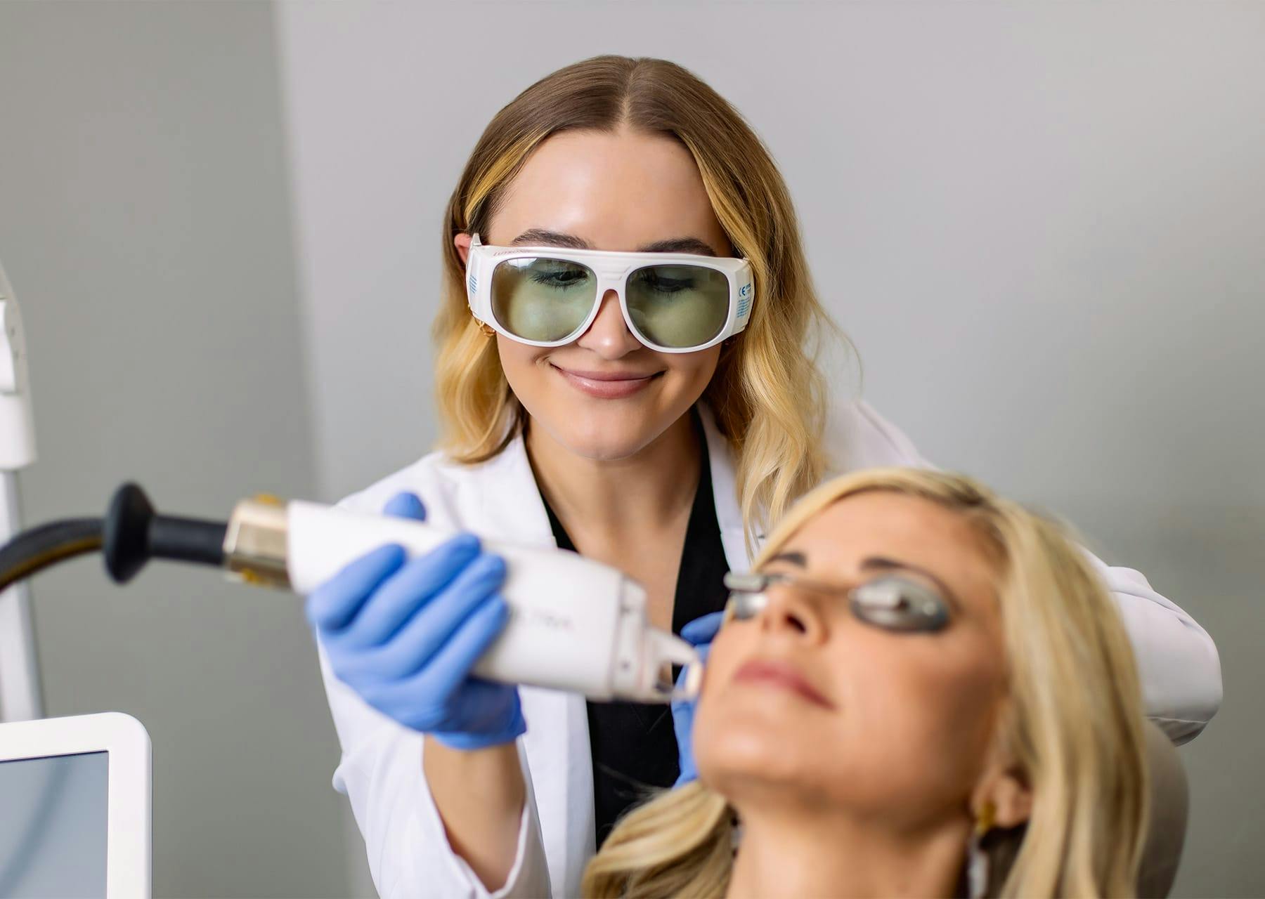 woman getting a face treatment done