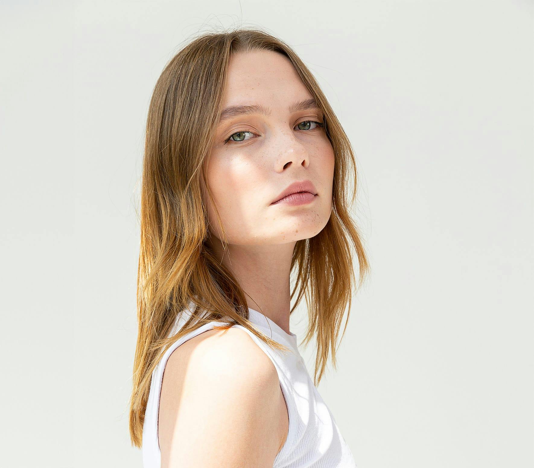 Woman in white shirt