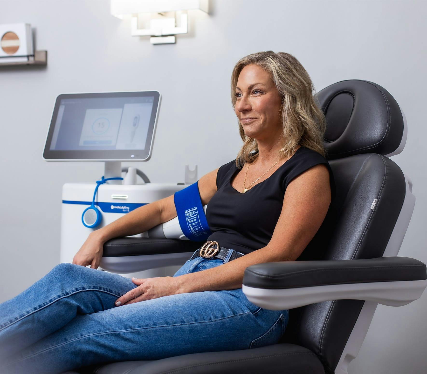 woman getting a coolscultping treatment on her arm