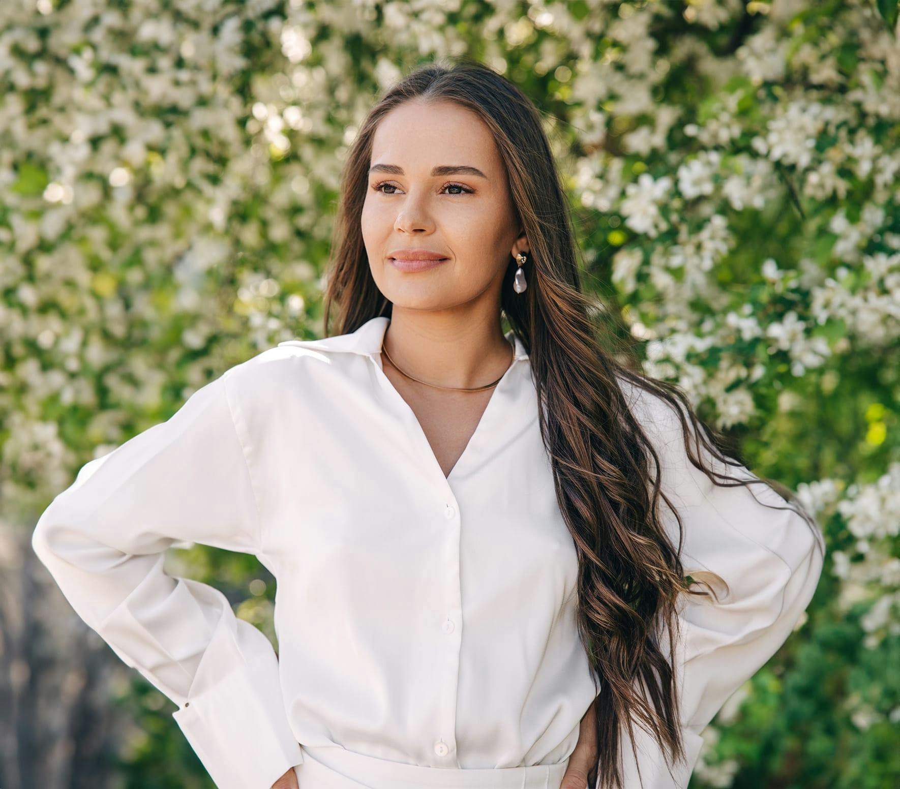 woman with long brown curly hair