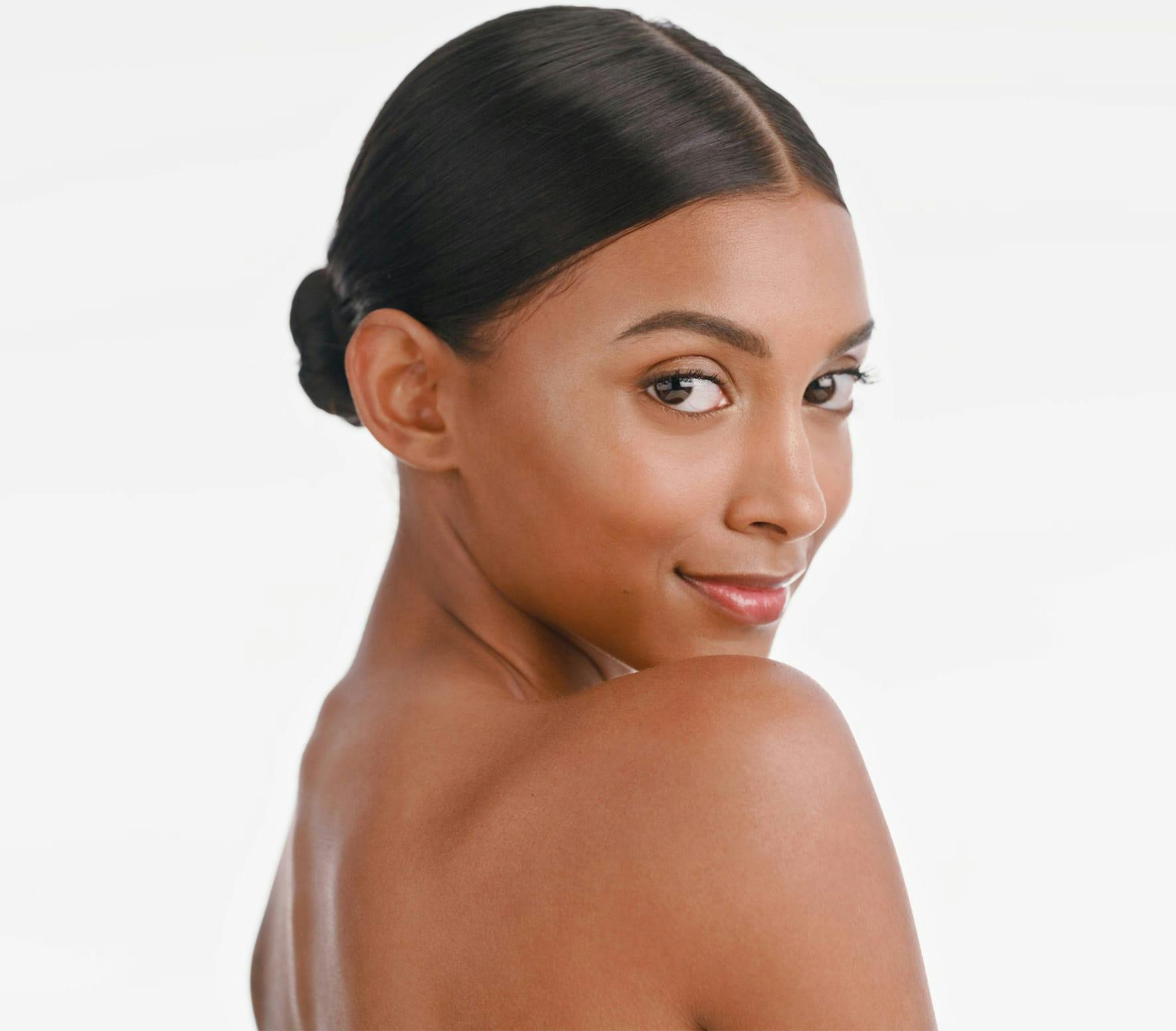 Woman glancing over shoulder