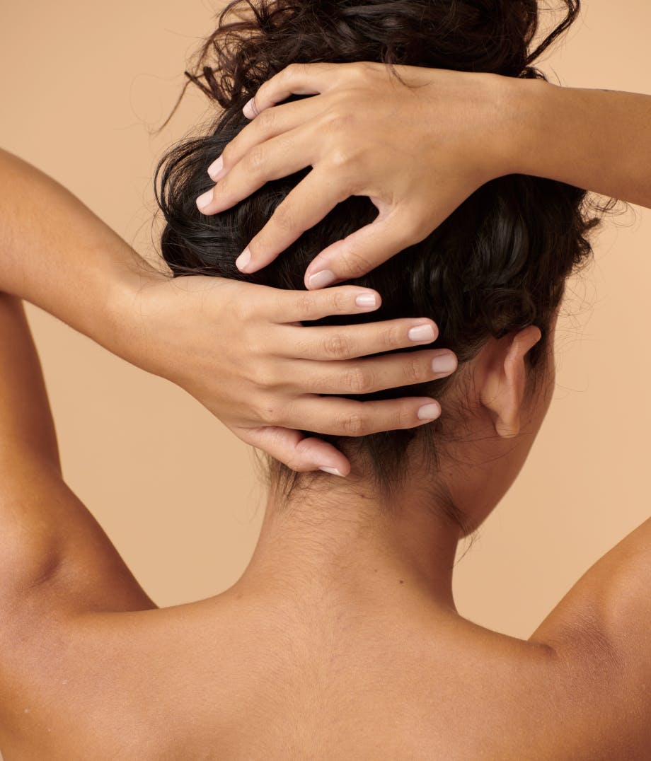 Woman holding up hair
