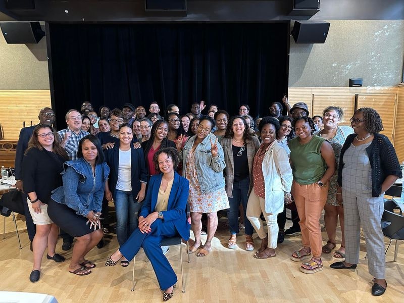 large workshop group smiling