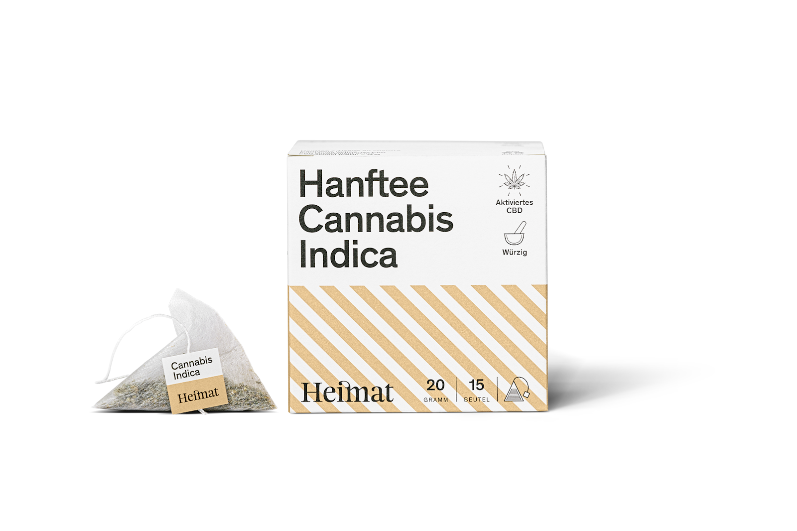 Box and tea bag of "Heimat Hanftee Cannabis Indica" with text indicating 20 grams and 15 servings.