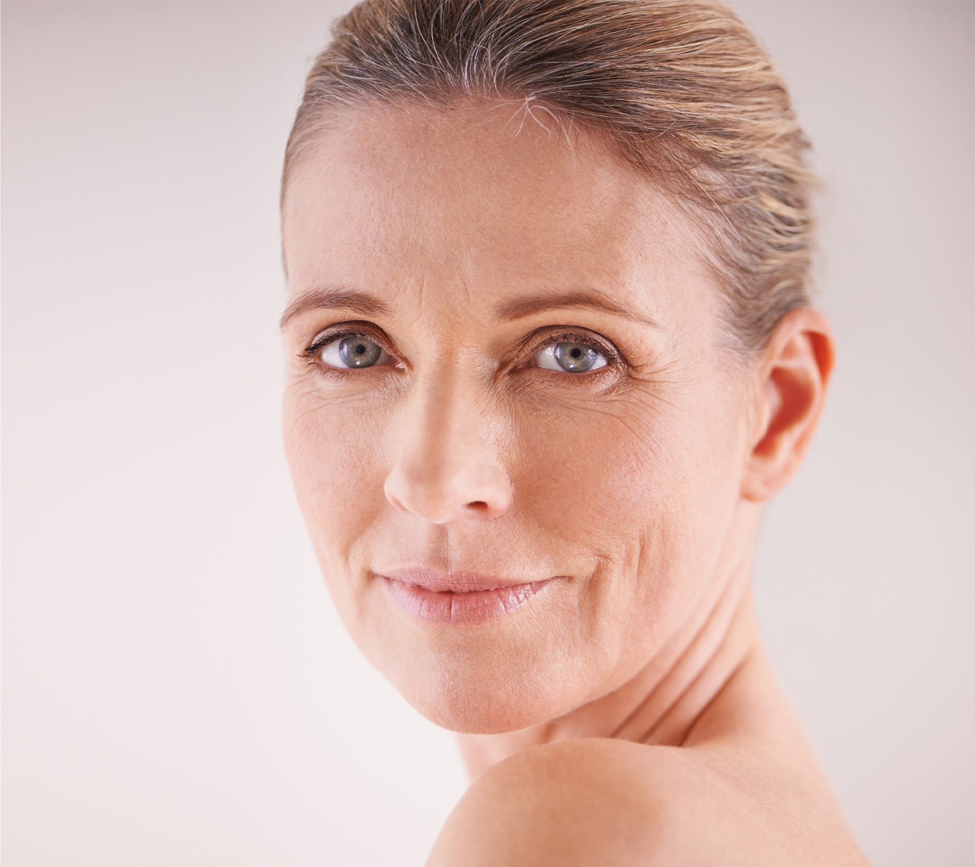 older woman with her hair pulled back