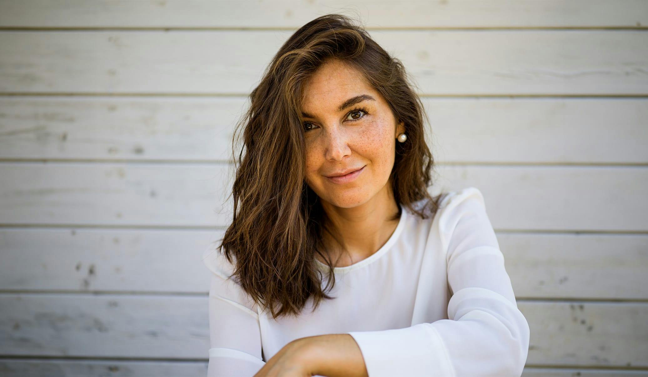 woman with medium length brown wavy hair