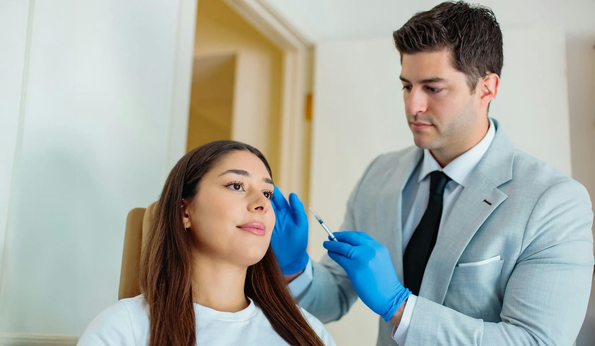Dr. Caniglia giving a patient an injection