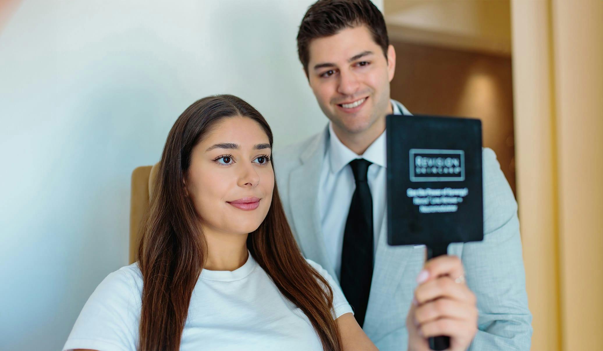 Dr. Caniglia with a female patient
