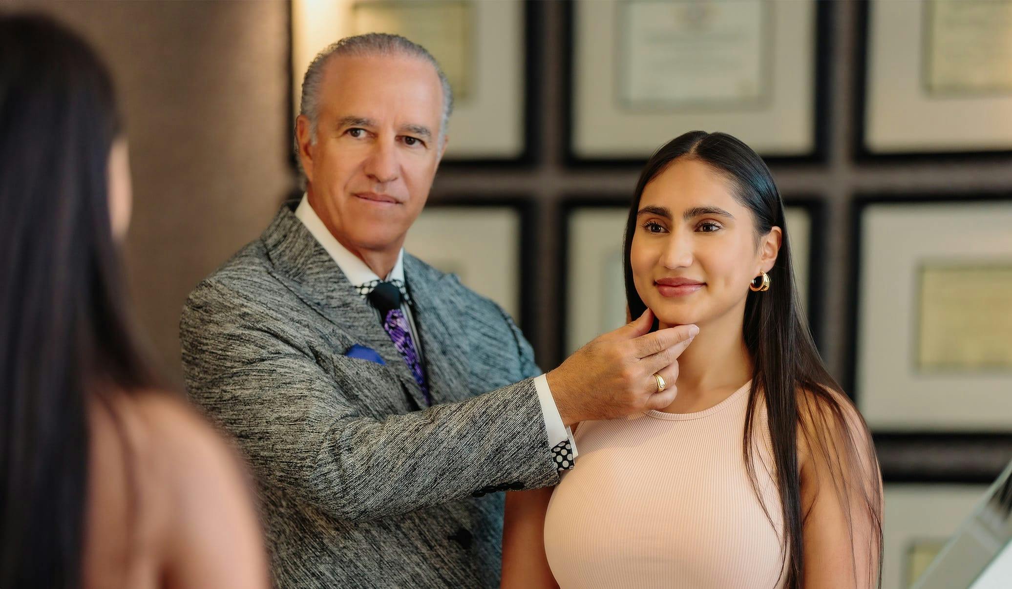 Dr. Caniglia with a female patient