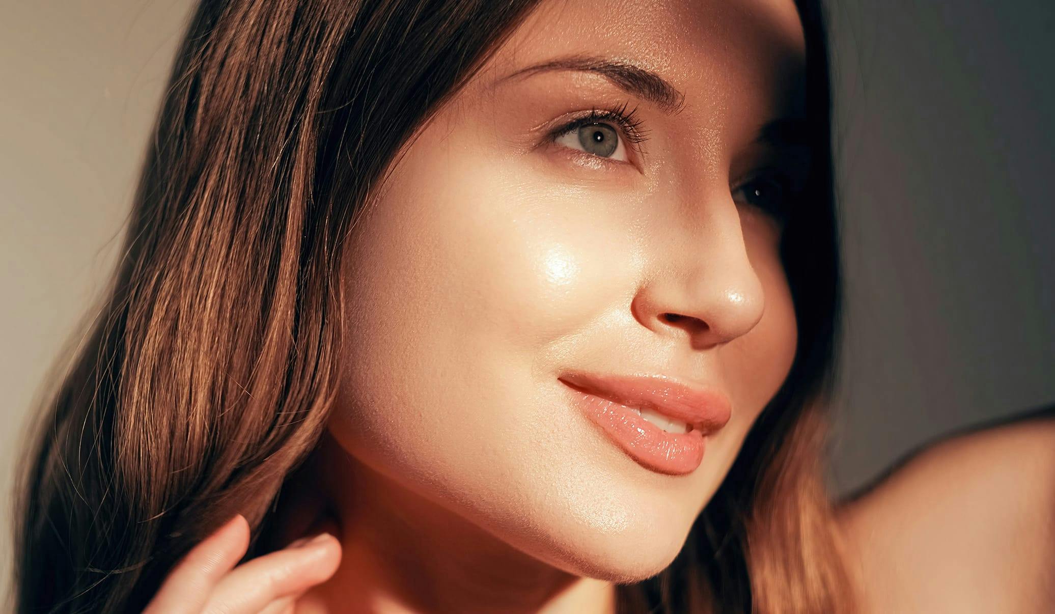 woman with the sun shining on her face