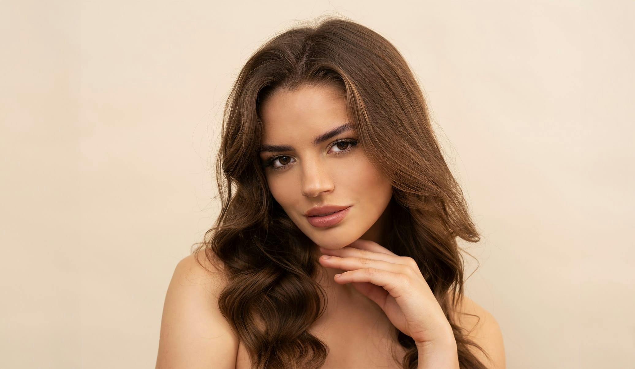 woman with long wavy brown hair