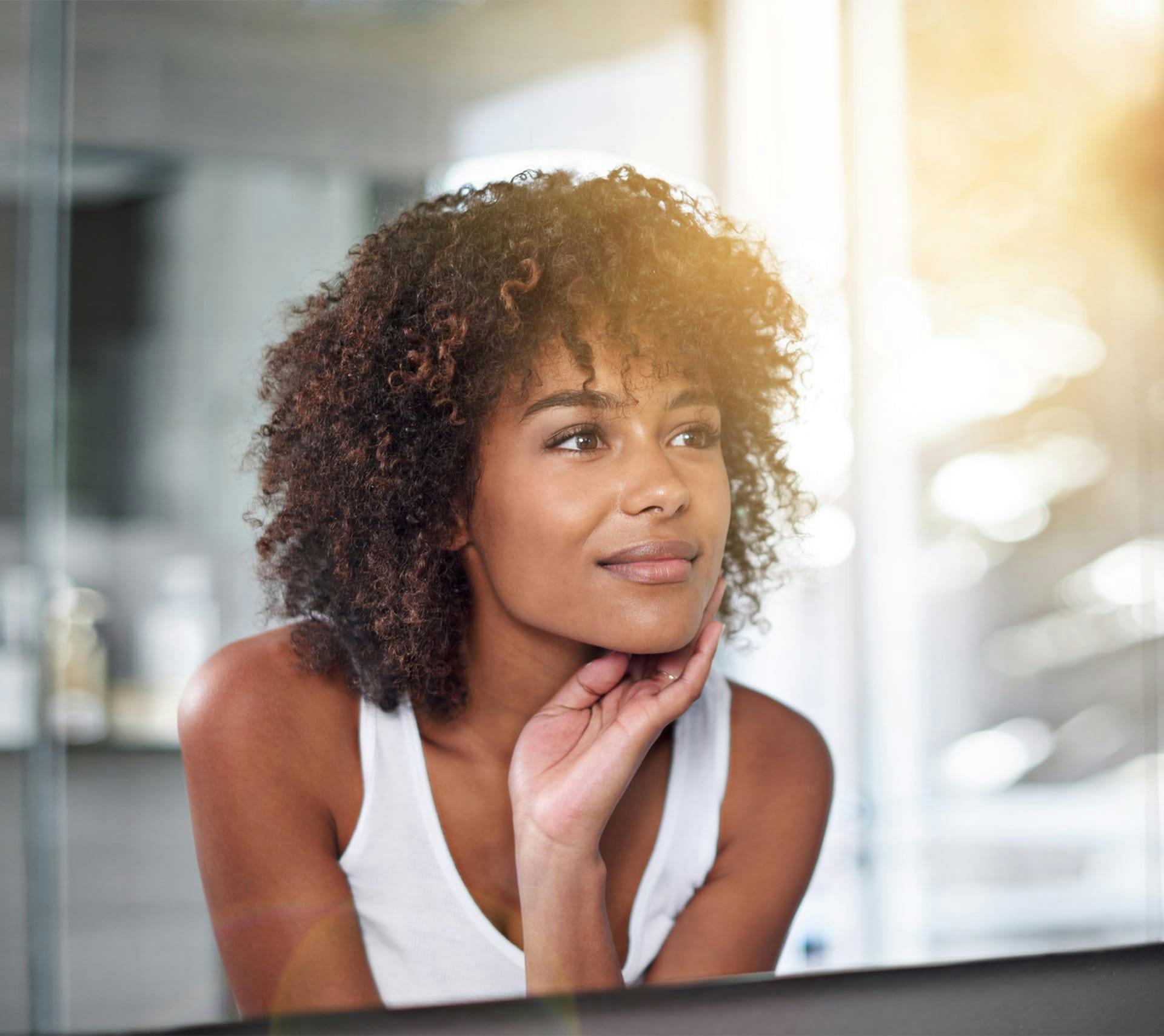 woman with very curly dark hair