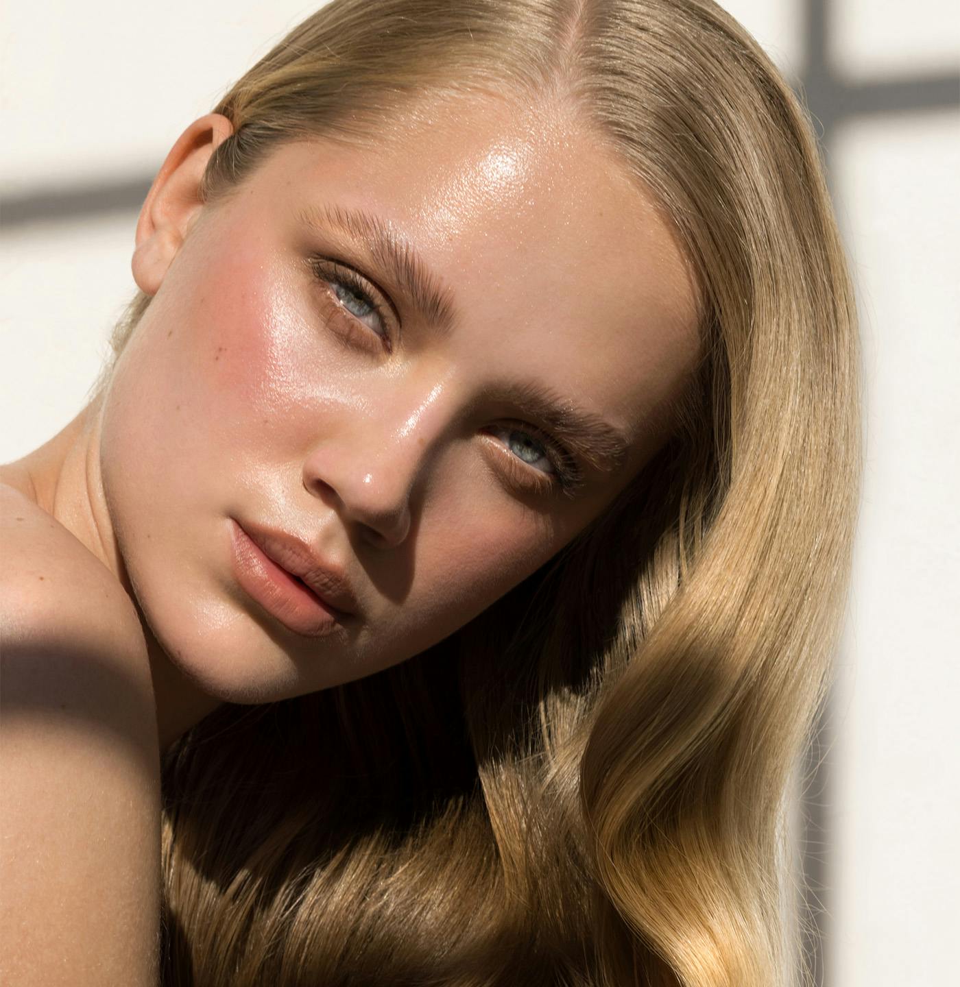 Woman with glossy skin