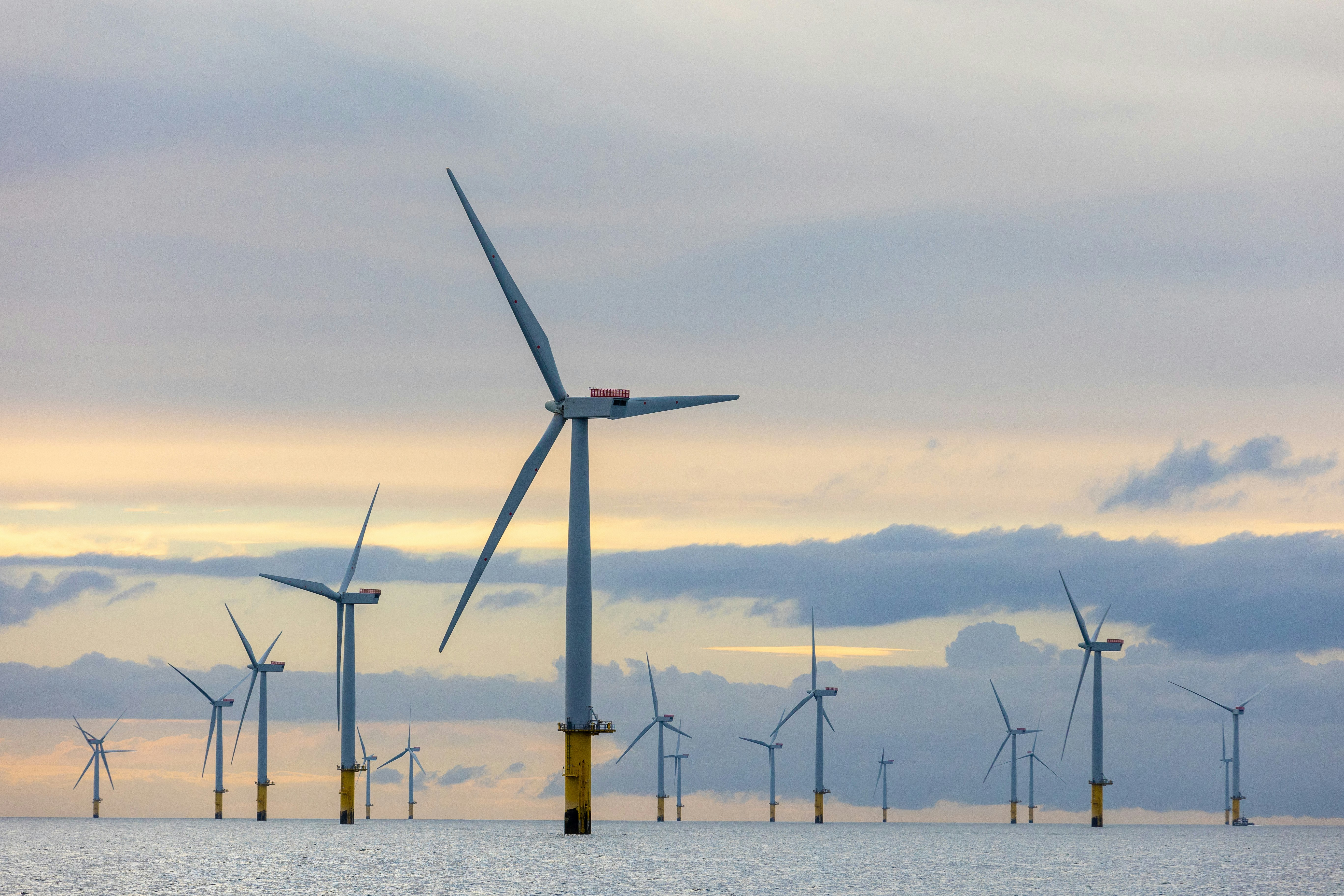 Offshore wind farm and ocean at sunrise