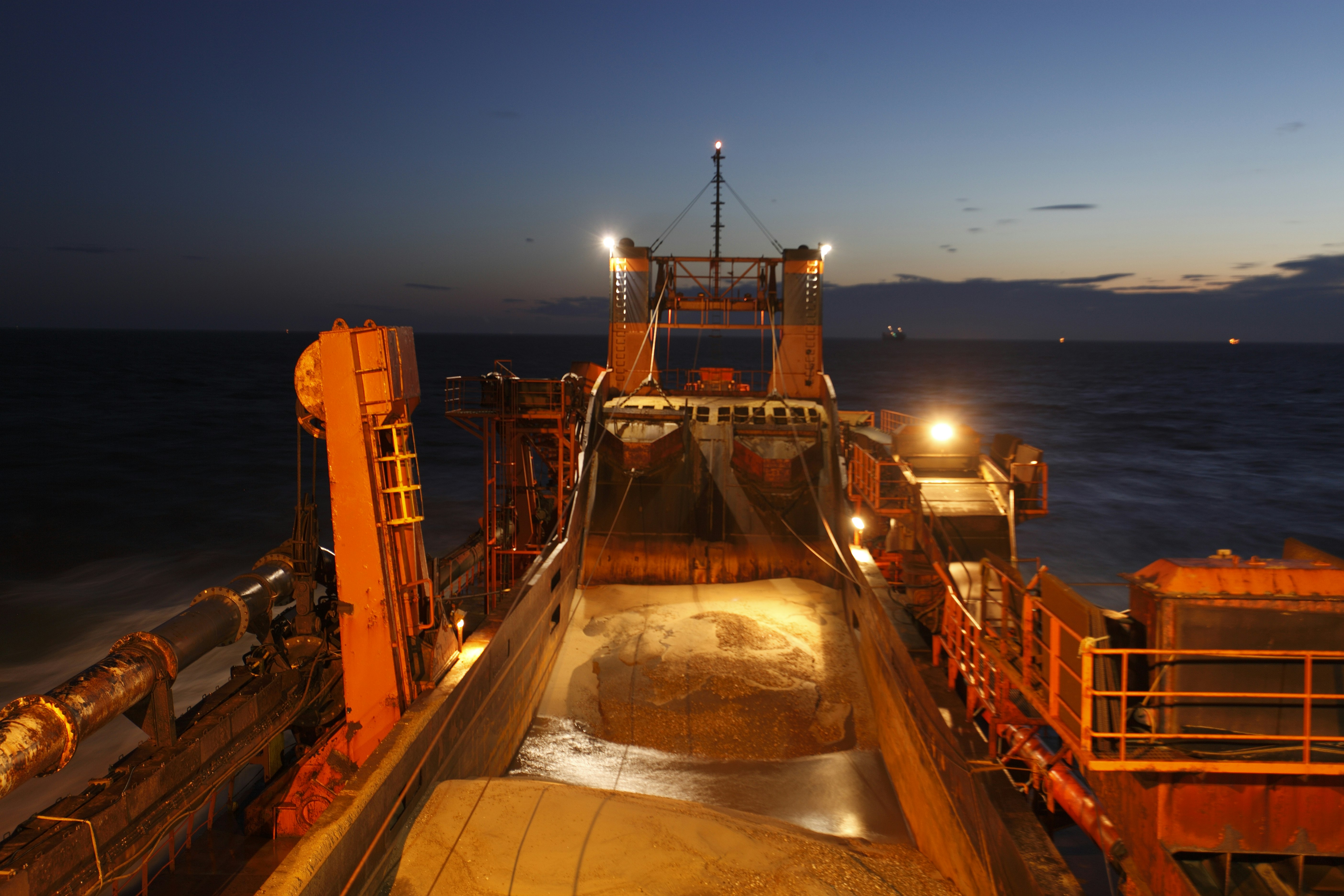Ship at sea under lights