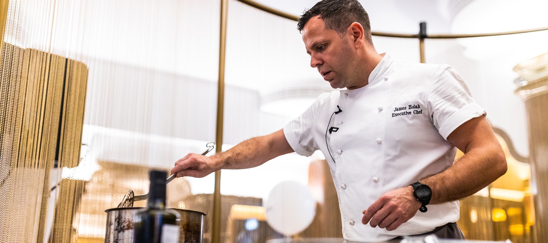 A chef delivering a cooking demonstration at our hospitality jobs fair in London.