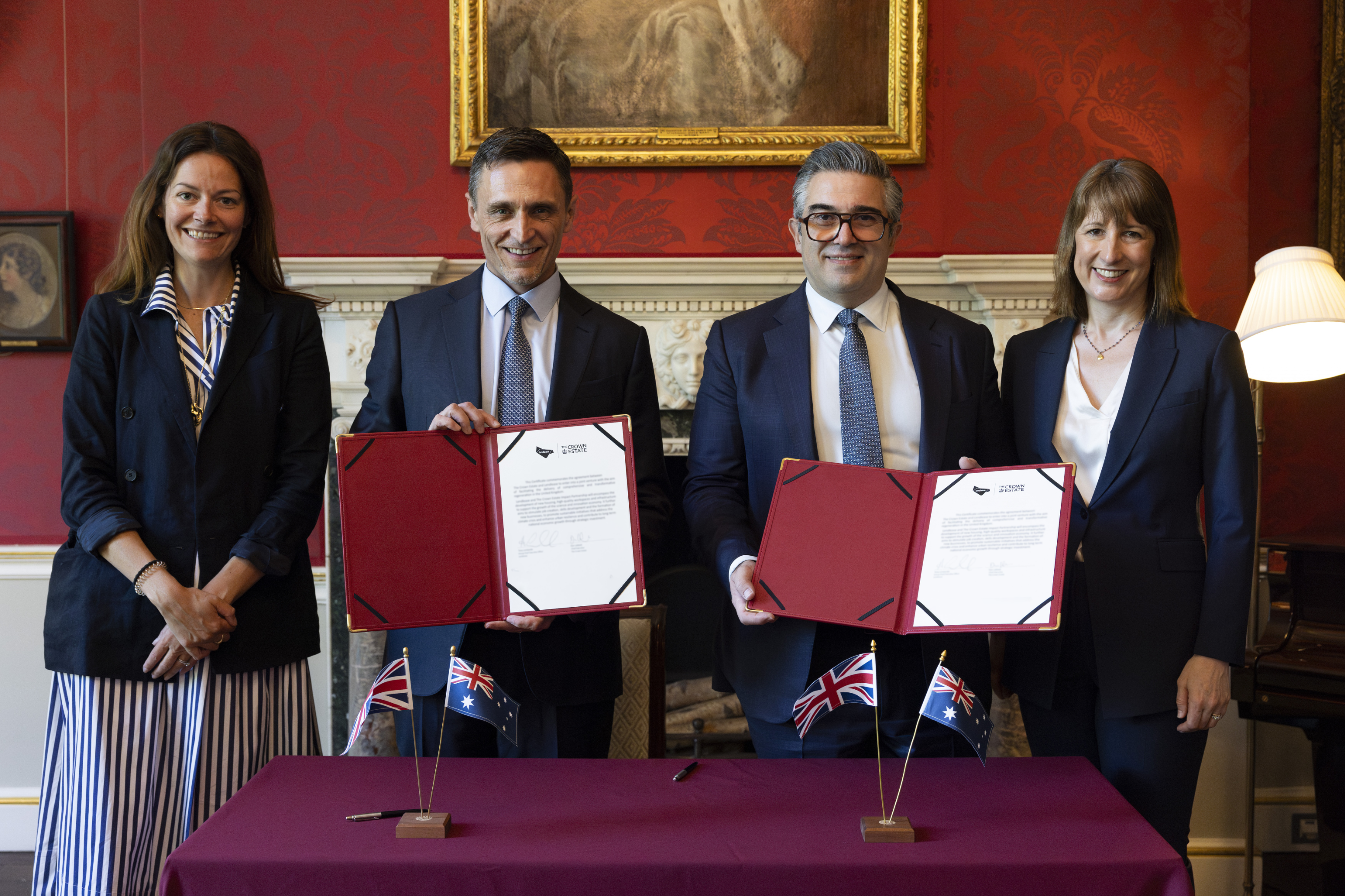 Baroness Gustafsson, Dan Labbad, Tony Lombardo and Rachel Reeves standing with documents