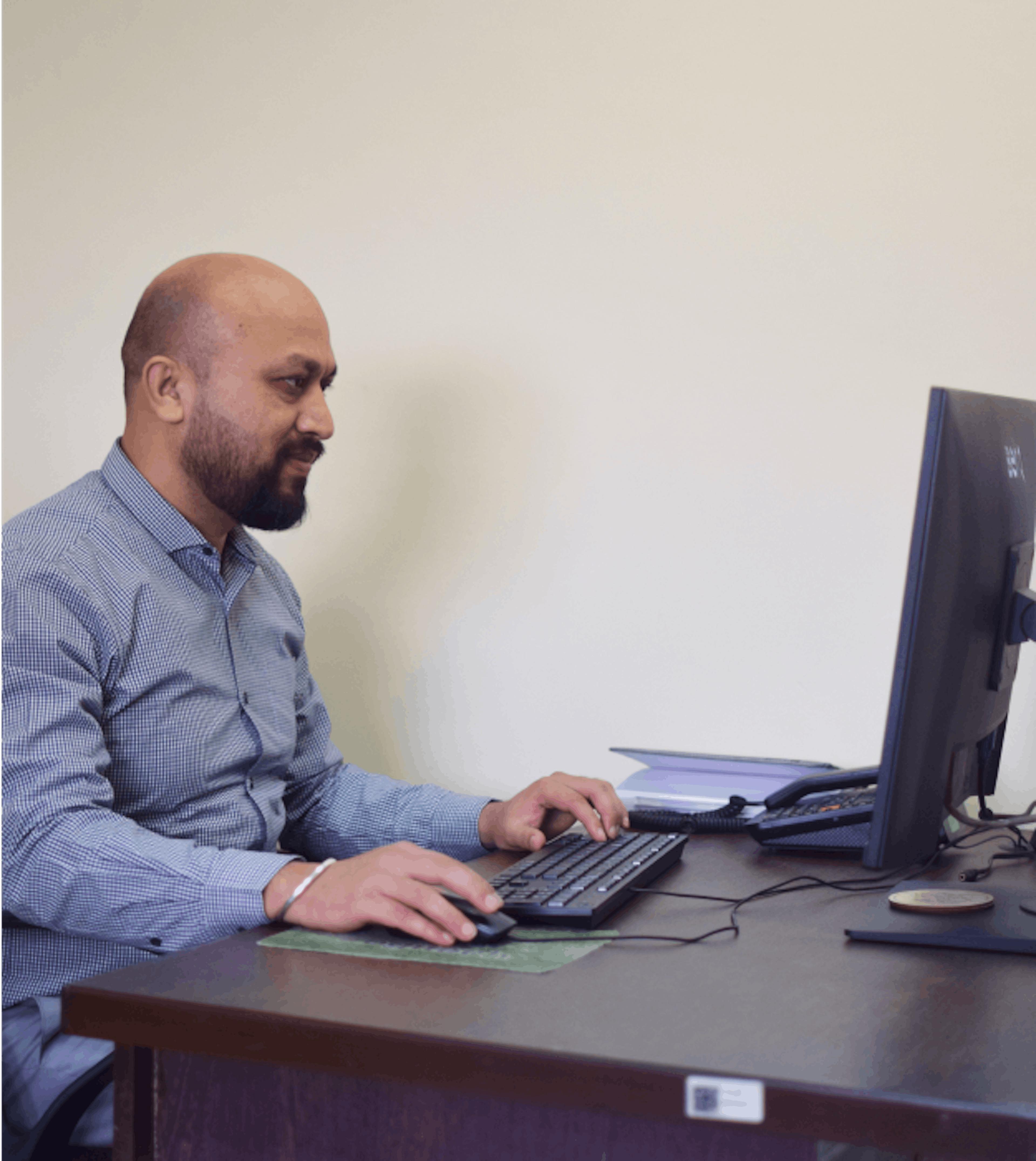 A person working on his computer system