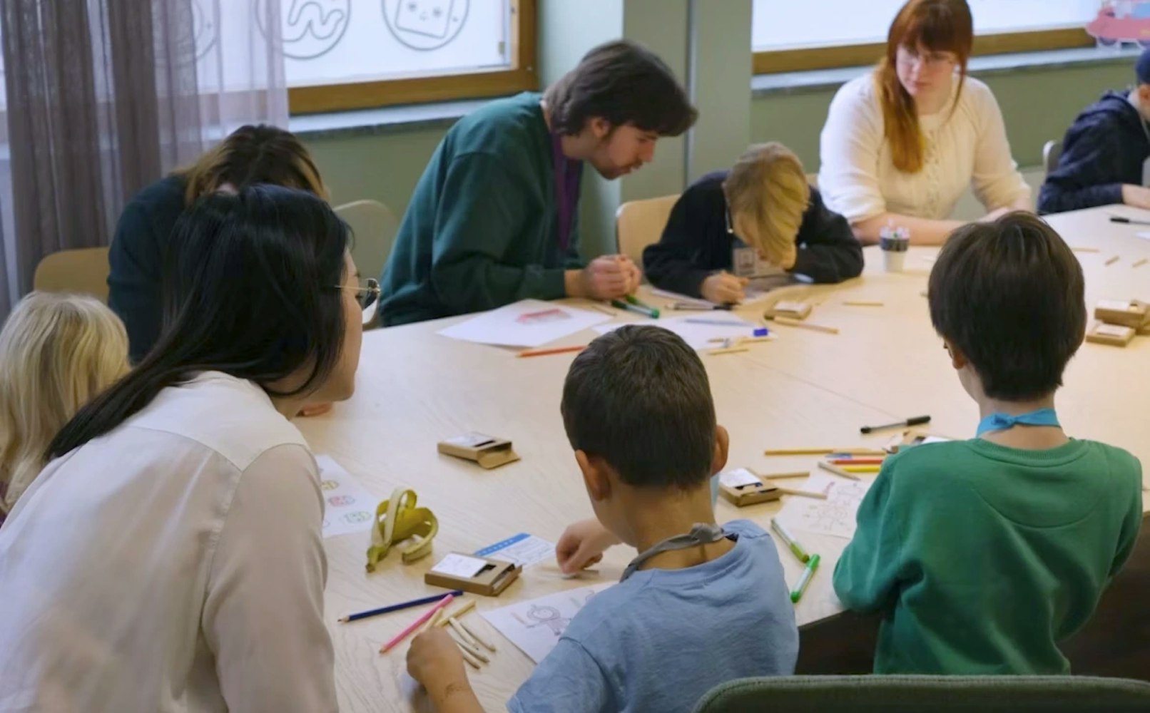 Children drawing during a class lesson