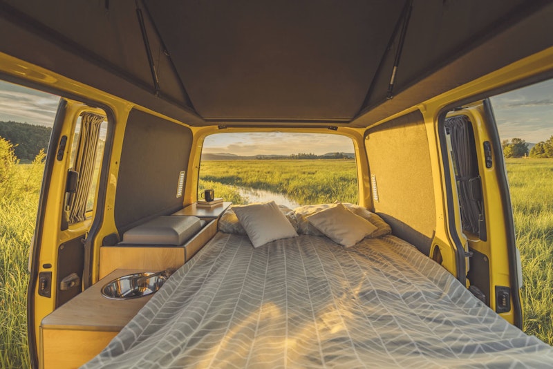View of the lower bedroom in VW T5 Campervan in Slovenia