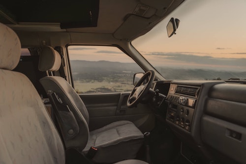 Dashboard inside VW T4 from Balkan Campers with a pop top roof in Ljubljana, Slovenia