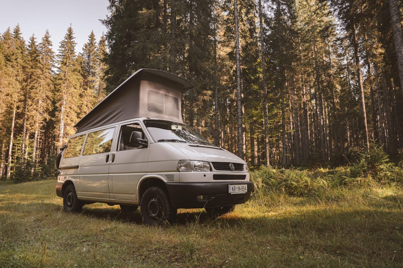 VW T4 with a pop top roof and 4WD from Balkan Campers in Slovenian forest