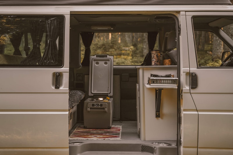 The view of the inside of VW T4 with pop top roof and 4WD from Balkan Campers in Triglav national park, Slovenia