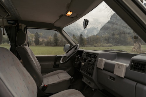 Dashboard inside VW T4 from Balkan Campers with a pop top roof in Karavanke mountains, Slovenia