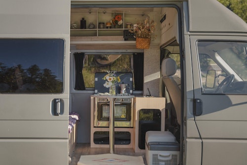 View of inside when you open a sliding door of VW T4 from Balkan Campers