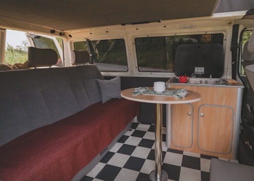 Living space in our VW T4 campervan Pipi with a pop top roof