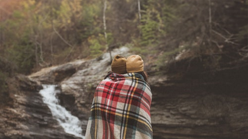 A couple with a blanket in Triglav national park, Slovenia