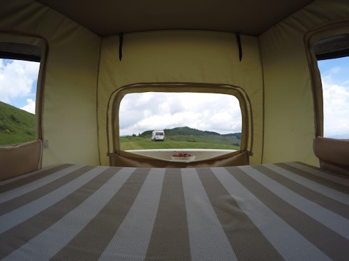 Upstairs bedroom in VW T3 campervan with pop top roof