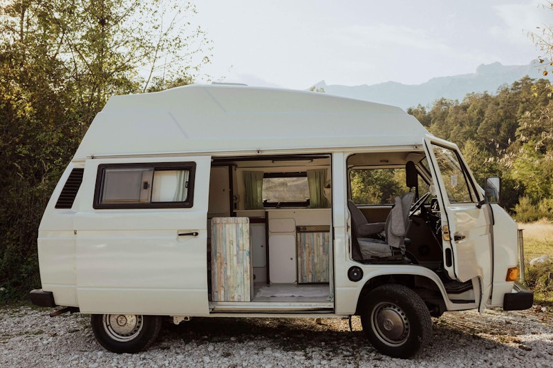 Side view of VW T3 from Balkan Campers next to Soča river, Slovenia