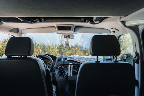 Dashboard inside the VW T5 from Balkan Campers with a pop top roof in Julian Alps, Slovenia