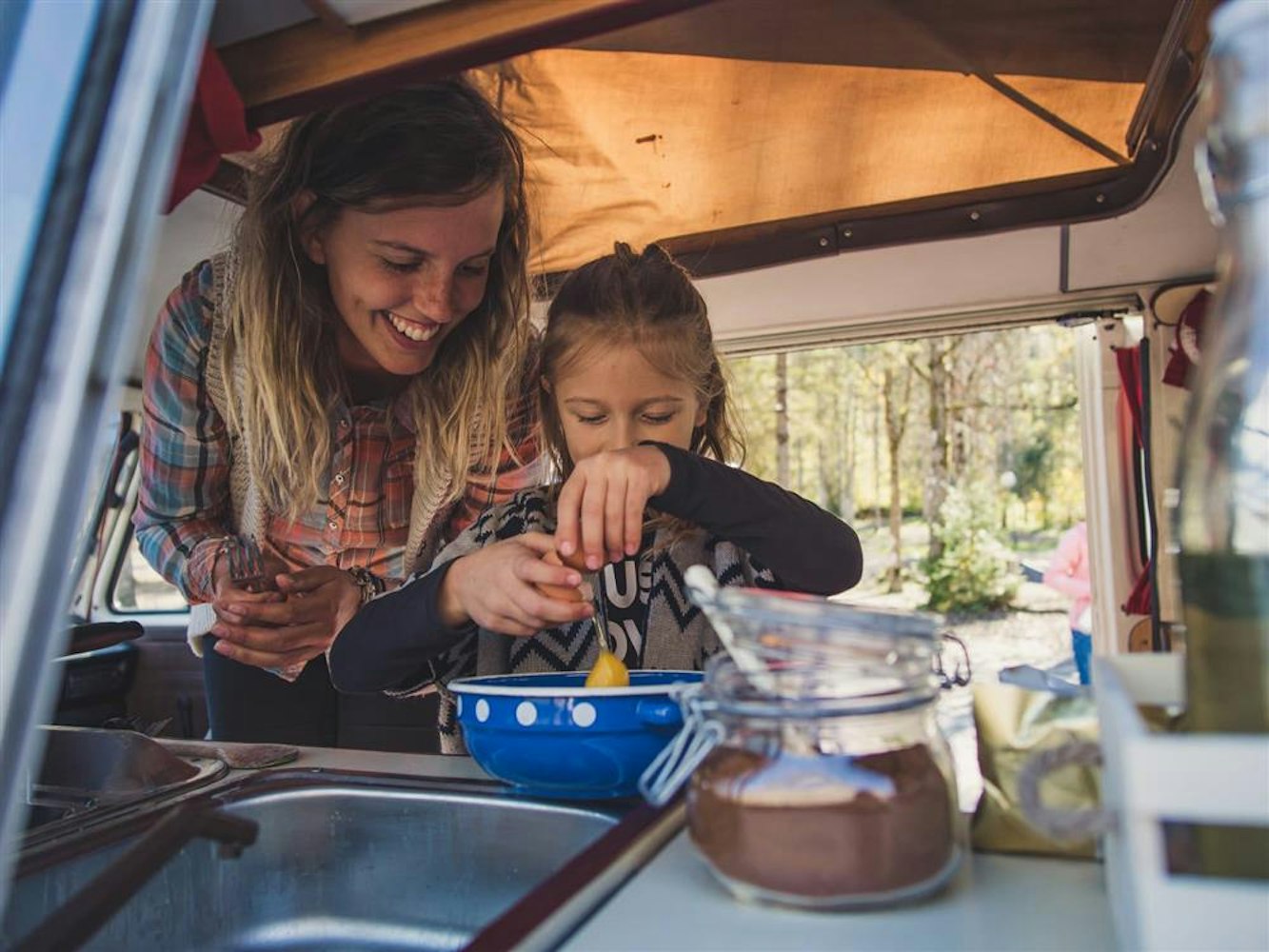 Cooking inside the campervan with your kids