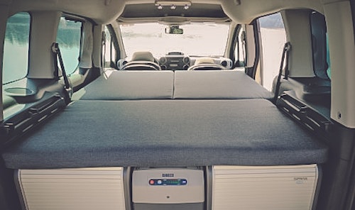 Cosy bed in VW Touran Campervan from Balkan Campers in Kranjska Gora, Slovenia